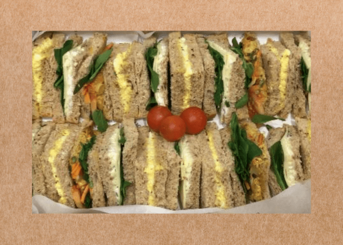 SOHO Coffee Co's Very Veggie platter box filled with a selection of vegetarian sandwiches.